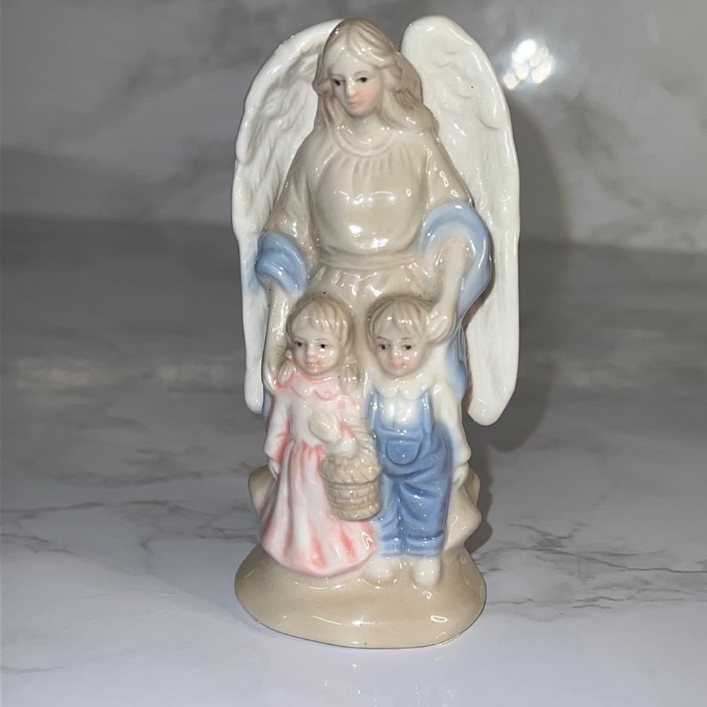 Beautiful Angel Looking over the little children. Ceramic figurine. Lovely Peace